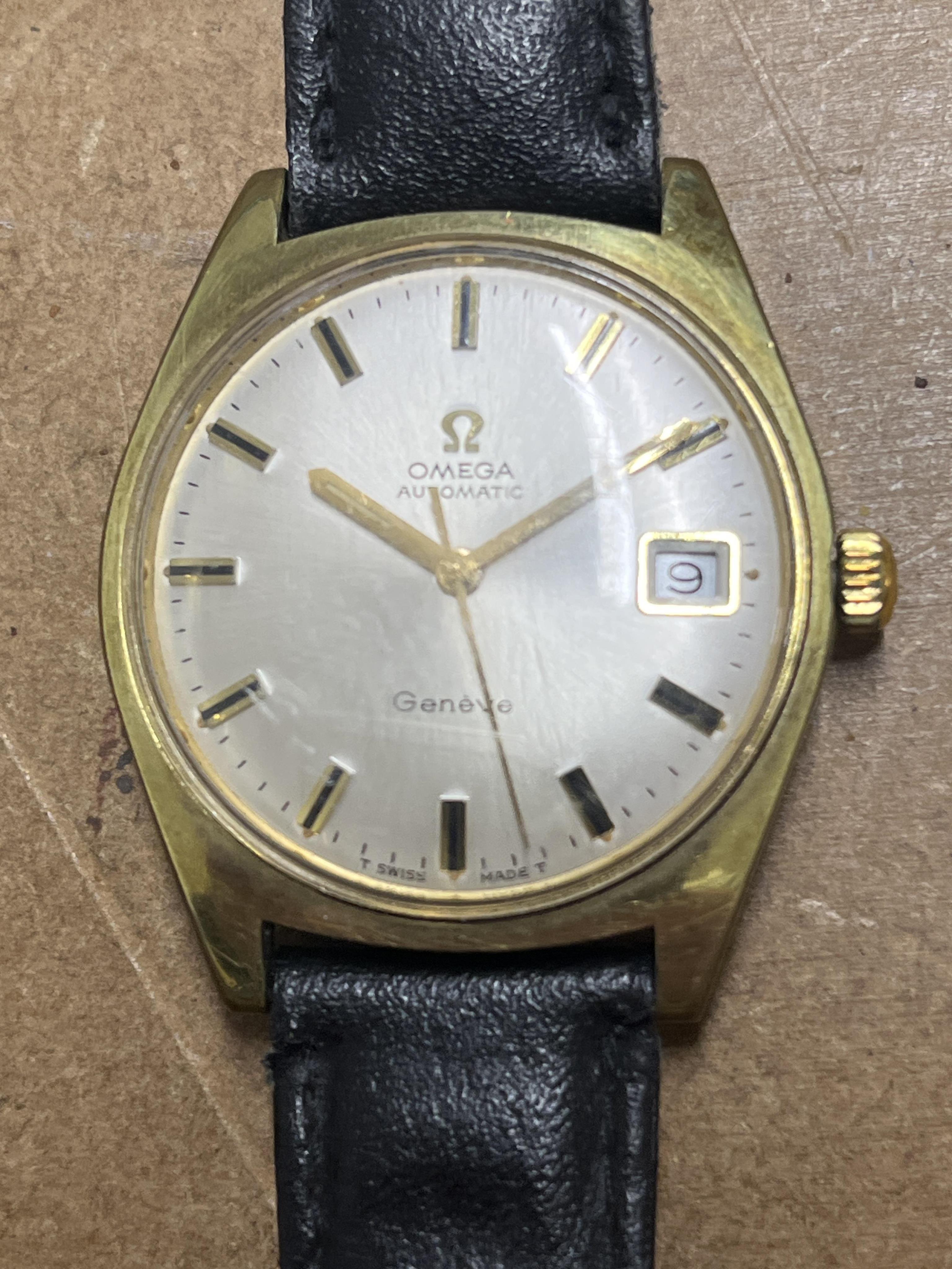 A gentleman's early 1970's Omega steel and gold plated automatic wrist watch, with baton numerals and date aperture, case diameter 35mm, with case back inscription, on an associated leather strap.